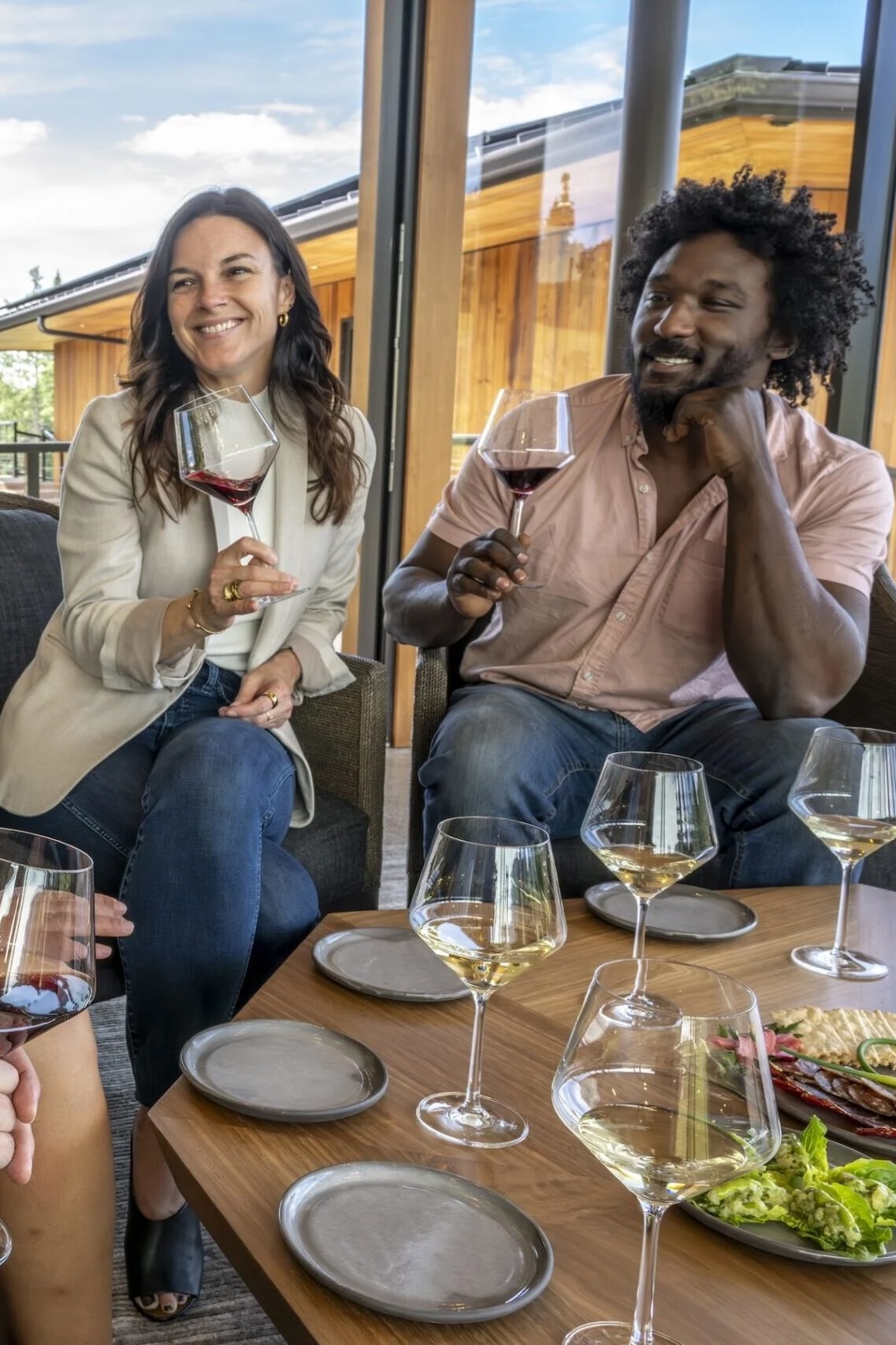 Woman and man with wine and food